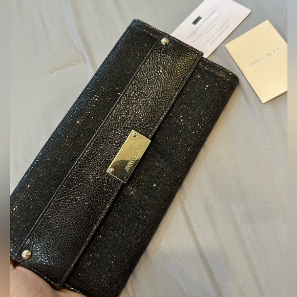 Jimmy Choo Black Clutch with Gold Closure with authentication card - Picture 1 of 6